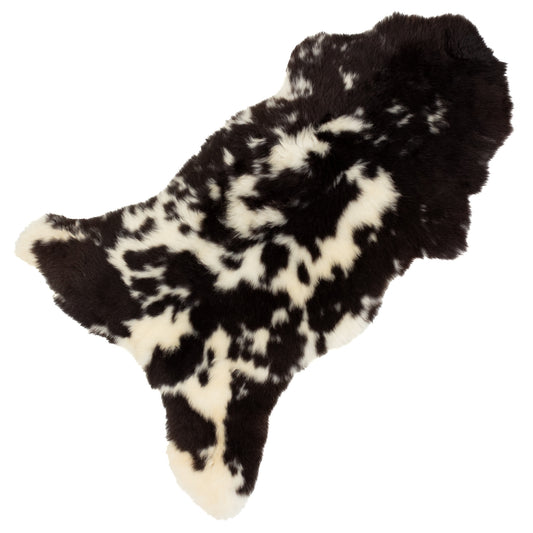 Short Wool Cushy Black and White Spots Sheepskin Rug