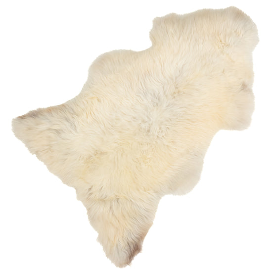 Soft Thick Creamy White w Light Mottling Sheepskin Rug